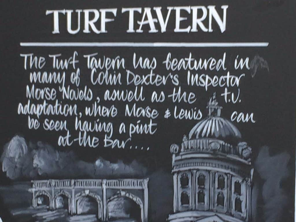Image of chalkboard are at Turf Tavern, Oxford England, explaining that ist was a favorie hangout for theauthro of Inspector Morse novels and the chracters Morse & Lewis in the TV adaptation of the books.