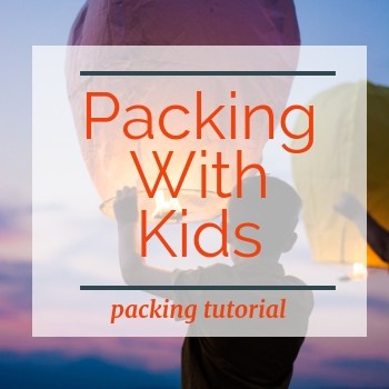 image of child with launch luminary balloon with text overlay Packing with Kids packing tutorial