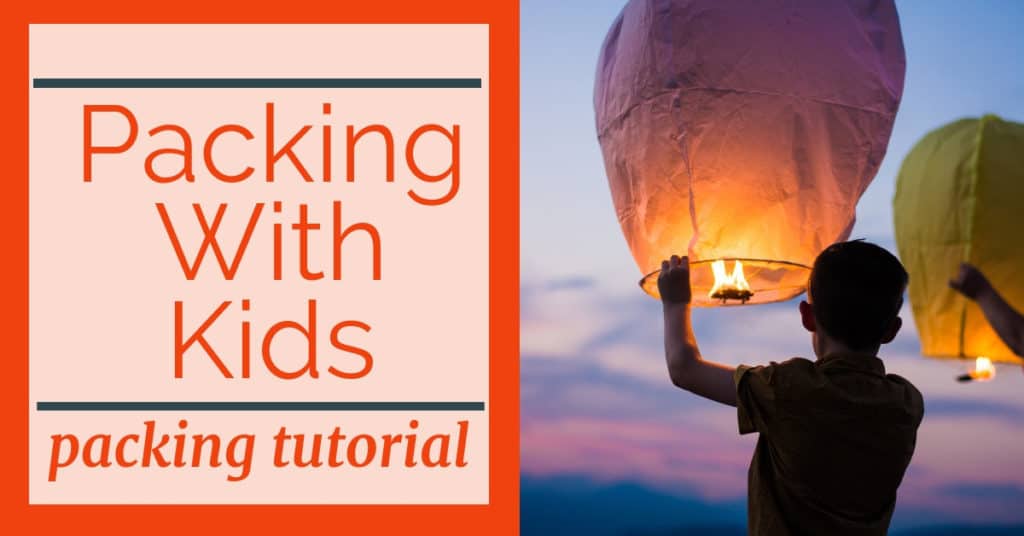 image of child with releasing paper lantern at sunset with text overlay Packing with Kids: Packing Tutorial.