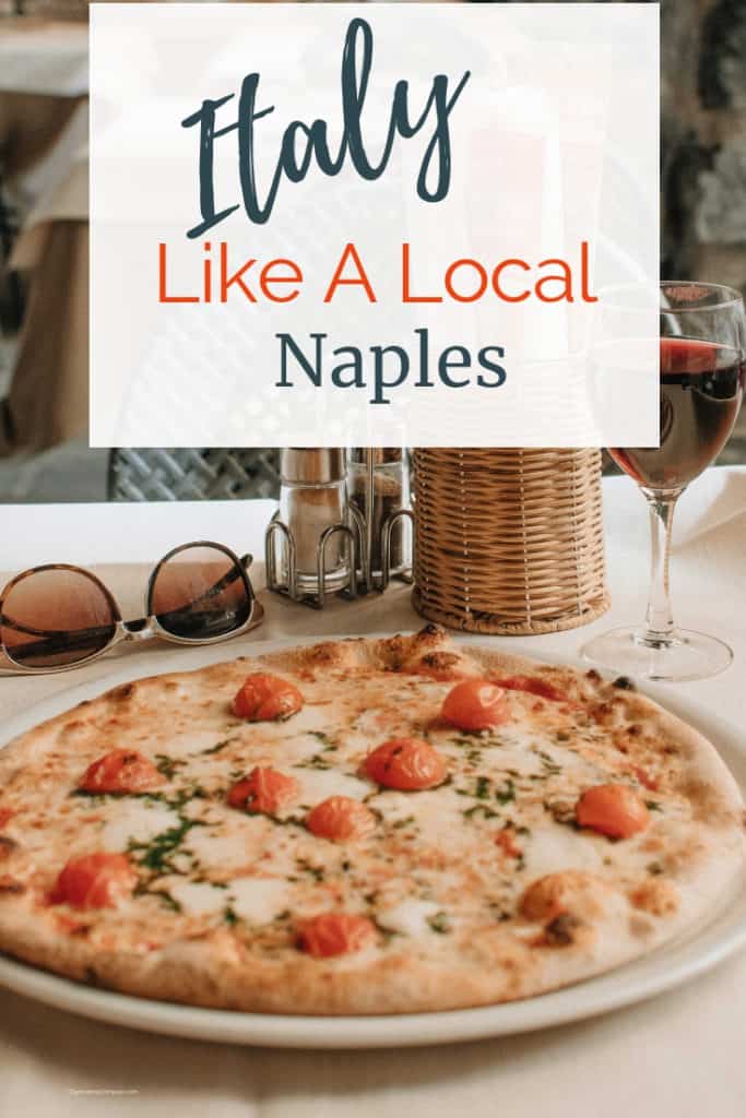 Image of pizza, wine, and sunglass at a table in Italy. with text overlay Naples Italy like a local.