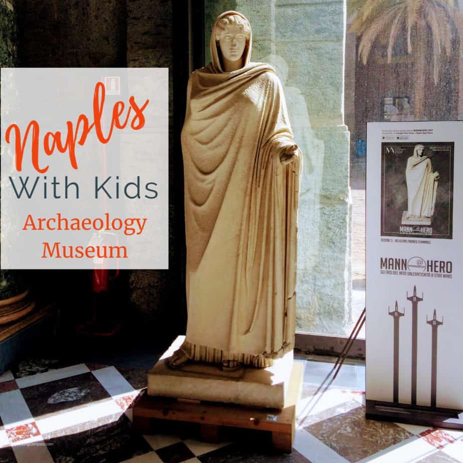 image of Roman statue and Mann Hero sign at Naples Archaeology Museum with text overlay: Naples with Kids - Archaeology Museum at www.captivatingcompass.com