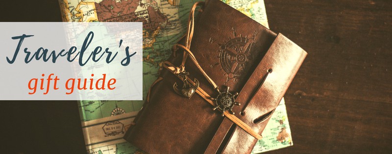 image of map and journal with text overlay a traveler's gift guide.